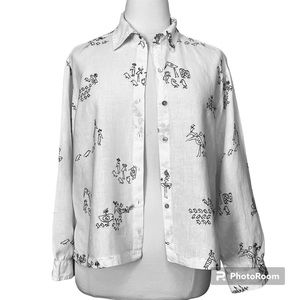 Chico’s long-sleeve button-down white shirt with black line drawings of birds